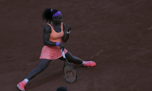 Serena Williams of the U.S. clenches her fist after scoring a point Timea Bacsinszky of Switzerland...