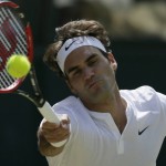 
              Roger Federer of Switzerland returns to Sam Groth of Australia during their singles match at the All England Lawn Tennis Championships in Wimbledon, London, Saturday July 4, 2015. (AP Photo/Tim Ireland)
            