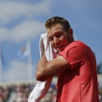 
              Jack Sock of the U.S. wipes his face with a towel in the fourth round match of the French Open tennis tournament against Spain's Rafael Nadal at the Roland Garros stadium, in Paris, France, Monday, June 1, 2015. (AP Photo/Michel Euler)
            