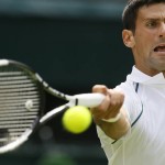 
              Novak Djokovic of Serbia plays a return to Philipp Kohlschreiber of Germany during the men's singles first round match at the All England Lawn Tennis Championships in Wimbledon, London, Monday June 29, 2015. (AP Photo/Kirsty Wigglesworth)
            