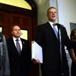               Massachusetts Gov. Charlie Baker, center, speaks next to Mass. Speaker of the House Robert DeLeo, left, Senate President Stanley Rosenberg, second from left, and Lt. Gov. Karyn Polito, right, during a news conference in Boston, Monday, July 27, 2015, regarding Boston no longer being a 2024 Summer Olympics contender. The U.S. Olympic Committee officially severed ties with Boston, saying it was exploring other options amid lackluster public support and concerns from elected leaders and organized opposition about the impact to taxpayers. (Ted Fitzgerald/The Boston Herald via AP)
            