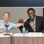 
              Debi Anderson, LA2015 Board Member and Special Olympics Athlete, left, jokes with Olympic Gold medalist Rafer Johnson, as he recalls the first Special Olympics World Games he attended, the first one ever held, at Chicago's Soldier Field in July 1968, during a news conference in Los Angeles Monday, July 20, 2015. The opening ceremony for the Special Olympics World Games Los Angeles 2015 will take place Saturday, July 25, 2015, in the historic Los Angeles Memorial Coliseum. (AP Photo/Damian Dovarganes)
            