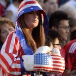 
              A United States fan watches during the first half pf the team's quarterfinal match against China in the FIFA Women's World Cup soccer tournament, Friday, June 26, 2015, in Ottawa, Ontario, Canada. (Adrian WyldThe Canadian Press via AP)
            
