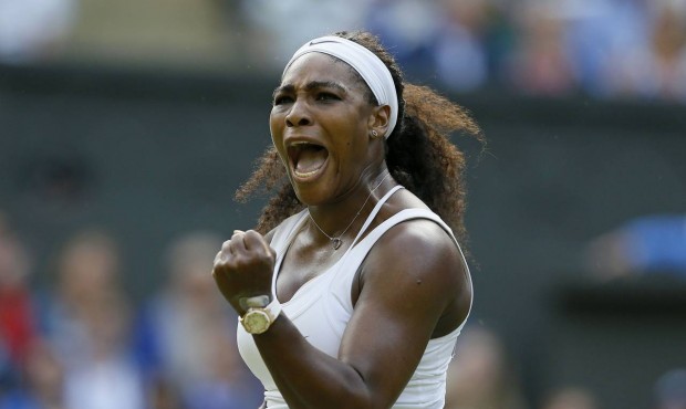Serena Williams of the United States celebrates after winning a point against Heather Watson of Bri...