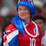 
              An England fan waits for Canada and England to play a quarterfinal of the Women's World Cup soccer tournament, Saturday, June 27, 2015, in Vancouver, British Columbia, Canada. (Darryl Dyck/The Canadian Press via AP)
            