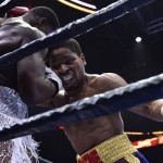 
              Adrien Broner, left, and Shawn Porter battle it out against the ropes during a welterweight fight on Saturday, June 20, 2015, in Las Vegas. (AP Photo/David Becker)
            