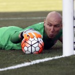 
              United States goalkeeper Brad Guzan dives to save a shot by Panama during the second half of the CONCACAF Gold Cup third place soccer match, Saturday, July 25, 2015, in Chester, Pa. (AP Photo/Matt Rourke)
            
