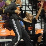 East's Stefanie Dolson, left, of the Washington Mystics, left, gestures a three-point basket as teammate Elena Delle Donne, right, of the Chicago Sky, celebrates along during the first half of the WNBA All-Star basketball game, Saturday, July 25, 2015, in Uncasville, Conn. (AP Photo/Jessica Hill)
