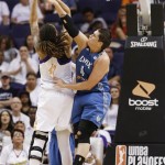 Phoenix Mercury's Brittney Griner (42) has her shot blocked by Minnesota Lynx's Janel McCarville (4) during the second half in a WNBA Western Conference Finals basketball game on Sunday, Sept. 29, 2013, in Phoenix. The Lynx defeated the Mercury 72-65 and won the Western Conference Finals 2-0, earning a trip to the WNBA Finals to face the Atlanta Dream. (AP Photo/Ross D. Franklin)
