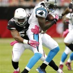 Carolina Panthers wide receiver Brandon LaFell (11) is tackled by Arizona Cardinals linebacker Daryl Washington (58) during the first half of a NFL football game, Sunday, Oct. 6, 2013, in Glendale, Ariz. (AP Photo/Matt York)