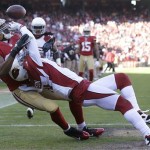 Arizona Cardinals cornerback Patrick Peterson (21) breaks up a pass intended for San Francisco 49ers wide receiver Randy Moss (84) during the second quarter of an NFL football game in San Francisco, Sunday, Dec. 30, 2012. (AP Photo/Marcio Jose Sanchez)