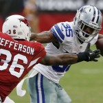 Dallas Cowboys' Joseph Randle (35) tries to get away from Arizona Cardinals' Tony Jefferson (36) just before Jefferson makes the tackle in the second half of a preseason NFL football game on Saturday, Aug. 17, 2013, in Glendale, Ariz. The Cardinals defeated the Cowboys 12-7. (AP Photo/Ross D. Franklin)