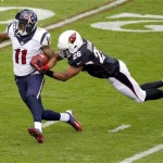 
Houston Texans wide receiver DeVier Posey (11) is tackled by Arizona Cardinals free safety Rashad Johnson (26) during the first half of an NFL football game Sunday, Nov. 10, 2013, in Glendale, Ariz. (AP Photo/Rick Scuteri)
