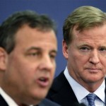 NFL commissioner Roger Goodell, right, listens to New Jersey Gov. Chris Christie speak at an NFL Foundation news conference Monday, Jan 27, 2014, in Newark, N.J. (AP Photo/Charlie Riedel)