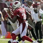 Arizona Cardinals cornerback Patrick Peterson (21) intercepts a pass intended for Tampa Bay Buccaneers wide receiver Vincent Jackson (83) during the fourth quarter of an NFL football game on Sunday, Sept. 29, 2013, in Tampa, Fla. (AP Photo/Chris O'Meara)