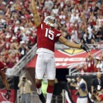 Arizona Cardinals wide receiver Michael Floyd celebrates his touchdown against the Atlanta Falcons during the first half of an NFL football game Sunday, Oct. 27, 2013, in Glendale, Ariz. (AP Photo/Ross D. Franklin)