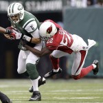 New York Jets quarterback Mark Sanchez (6) is sacked by Arizona Cardinals cornerback William Gay (22) during the second half of an NFL football game, Sunday, Dec. 2, 2012, in East Rutherford, N.J. (AP Photo/Kathy Willens)