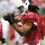 Arizona Cardinals wide receiver Larry Fitzgerald warms up prior to an NFL football game against the Atlanta Falcons, Sunday, Oct. 27, 2013, in Glendale, Ariz. (AP Photo/Rick Scuteri)