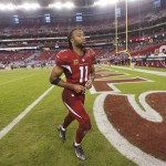 Arizona Cardinals wide receiver Larry Fitzgerald (11) leaves the field after an NFL football game against the Indianapolis Colts, Sunday, Nov. 24, 2013, in Glendale, Ariz. The Cardinals won 40-11. (AP Photo/Matt York)