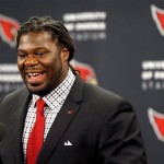 Arizona Cardinals first-round draft pick Jonathan Cooper is introduced on Friday, April 26, 2013, at the Cardinals' training facility in Tempe, Ariz. Cooper was selected seventh overall in the NFL football draft. (AP Photo/Matt York)