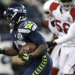 Seattle Seahawks running back Leon Washington (33) scores on a 3-yard touchdown run against the Arizona Cardinals during the fourth quarter of an NFL football game in Seattle, Sunday, Dec. 9, 2012. The Seahawks won 58-0. (AP Photo/John Froschauer)