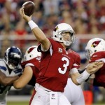 Arizona Cardinals quarterback Carson Palmer (3) throws against the Seattle Seahawks during the first half of an NFL football game, Thursday, Oct. 17, 2013, in Glendale, Ariz. (AP Photo/Ross D. Franklin)