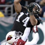 Philadelphia Eagles' Riley Cooper, top, is unable to pull in a pass against Arizona Cardinals' Jerraud Powers during the second half of an NFL football game, Sunday, Dec. 1, 2013, in Philadelphia. (AP Photo/Michael Perez)