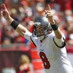 Tampa Bay Buccaneers quarterback Mike Glennon celebrates after throwing a touchdown pass to wide receiver Mike Williams during the first quarter of an NFL football game against the Arizona Cardinals Sunday, Sept. 29, 2013, in Tampa, Fla. (AP Photo/Reinhold Matay)