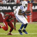 Indianapolis Colts wide receiver Darrius Heyward-Bey (81) pulls in a pass as Arizona Cardinals cornerback Patrick Peterson (21) defends during the second half of an NFL football game, Sunday, Nov. 24, 2013, in Glendale, Ariz. (AP Photo/Rick Scuteri)