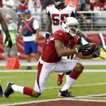 Arizona Cardinals wide receiver Michael Floyd, front, celebrates his touchdown against the Atlanta Falcons during the first half of an NFL football game Sunday, Oct. 27, 2013, in Glendale, Ariz. (AP Photo/Ross D. Franklin)