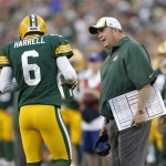 Green Bay Packers head coach Mike McCarthy talks to quarterback Graham Harrell during the first half of a preseason NFL football game against the Arizona Cardinals Friday, Aug. 9, 2013, in Green Bay, Wis. (AP Photo/Mike Roemer)