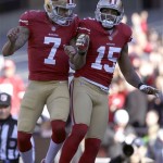 San Francisco 49ers quarterback Colin Kaepernick (7) celebrates with wide receiver Michael Crabtree (15) after they connected on a 49-yard touchdown pass against the Arizona Cardinals during the second quarter of an NFL football game in San Francisco, Sunday, Dec. 30, 2012. (AP Photo/Marcio Jose Sanchez)