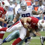 Arizona Cardinals quarterback Drew Stanton (5) is sacked by Dallas Cowboys defensive end Ben Bass during the first half of a preseason NFL football game, on Saturday, Aug. 17, 2013, in Glendale, Ariz. (AP Photo/Rick Scuteri)