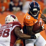 Denver Broncos wide receiver Tavarres King is tackled by Arizona Cardinals inside linebacker Daryl Washington (58) after a reception during the first quarter of a preseason NFL football game, Thursday, Aug. 29, 2013, in Denver. (AP Photo/Jack Dempsey)