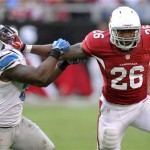 Arizona Cardinals running back Beanie Wells (26) stiff-arms Detroit Lions middle linebacker Stephen Tulloch (55) during the second half of an NFL football game on Sunday, Dec. 16, 2012, in Glendale, Ariz. (AP Photo/Paul Connors)