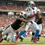 Carolina Panthers quarterback Cam Newton (1) is sacked in the end zone for a safety by Arizona Cardinals defensive end Calais Campbell (93) during the second half of a NFL football game, Sunday, Oct. 6, 2013, in Glendale, Ariz. (AP Photo/Ross D. Franklin)