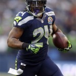 Seattle Seahawks running back Marshawn Lynch (24) runs for a 20-yard touchdown against the Arizona Cardinals during the first quarter of an NFL football game in Seattle, Sunday, Dec. 9, 2012. (AP Photo/John Froschauer)