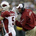 Arizona Cardinals head coach Bruce Arians talks to Drew Stanton (5) during the first half of a preseason NFL football game against the Green Bay Packers Friday, Aug. 9, 2013, in Green Bay, Wis. (AP Photo/Tom Lynn)