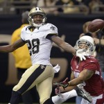New Orleans Saints cornerback Keenan Lewis (28) breaks up a pass intended for Arizona Cardinals wide receiver Michael Floyd (15) in the first half of an NFL football game in New Orleans, Sunday, Sept. 22, 2013. (AP Photo/Bill Feig)