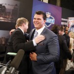Jake Matthews, from Texas A&M, is congratulated after being selected sixth overall by the Atlanta Falcons in the first round of the NFL football draft, Thursday, May 8, 2014, at Radio City Music Hall in New York. (AP Photo/Jason DeCrow)
