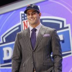 Eastern Illinois quarterback Jimmy Garoppolo poses for photos after being selected as the 62nd pick by the New England Patriots in the second round of the 2014 NFL Draft, Friday, May 9, 2014, in New York. (AP Photo/Jason DeCrow)