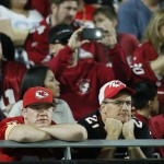 Kansas City Chiefs fans watch during the second half of an NFL football game against the Arizona Cardinals, Sunday, Dec. 7, 2014, in Glendale, Ariz. The Cardinals won 17-14 to improve to 10-3. (AP Photo/Matt York)