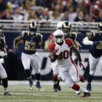 Arizona Cardinals' Stepfan Taylor (30) runs during the first half of an NFL football game against the St. Louis Rams Thursday, Dec. 11, 2014 in St. Louis. (AP Photo/Jeff Roberson)