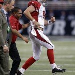 Arizona Cardinals quarterback Drew Stanton (5) limps off the field after getting injured during the second half of an NFL football game against the St. Louis Rams Thursday, Dec. 11, 2014 in St. Louis. (AP Photo/Jeff Roberson)
