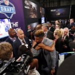 Odell Beckham, Jr., from LSU, is congratulated after being selected 12th overall by the New York Giants in the first round of the NFL football draft, Thursday, May 8, 2014, at Radio City Music Hall in New York. (AP Photo/Jason DeCrow)