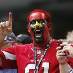 An Arizona Cardinals fan shows his support during the second half of an NFL football game against the Dallas Cowboys Sunday, Nov. 2, 2014, in Arlington, Texas. Arizona won the game 28-17. (AP Photo/Sue Ogrocki)