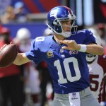 New York Giants quarterback Eli Manning (10) throws a pass during the first half of an NFL football game against the Arizona Cardinals, Sunday, Sept. 14, 2014, in East Rutherford, N.J. (AP Photo/Bill Kostroun)