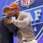 Indiana wide receiver Cody Latimer greets NFL commissioner Roger Goodell after being selected by the Denver Broncos as the 56th pick during the second round of the 2014 NFL Draft, Friday, May 9, 2014, in New York. (AP Photo/Jason DeCrow)