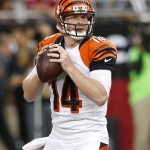  Cincinnati Bengals quarterback Andy Dalton (14) looks to pass against the Arizona Cardinals during the first half of an NFL preseason football game, Sunday, Aug. 24, 2014, in Glendale, Ariz. (AP Photo/Ross D. Franklin)