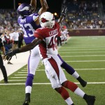  Minnesota Vikings wide receiver Rodney Smith, left, catches a 2-yard touchdown pass over Arizona Cardinals defensive back Jimmy Legree during the second half of an NFL preseason football game, Saturday, Aug. 16, 2014, in Minneapolis. The Vikings won 30-28. (AP Photo/Jim Mone)